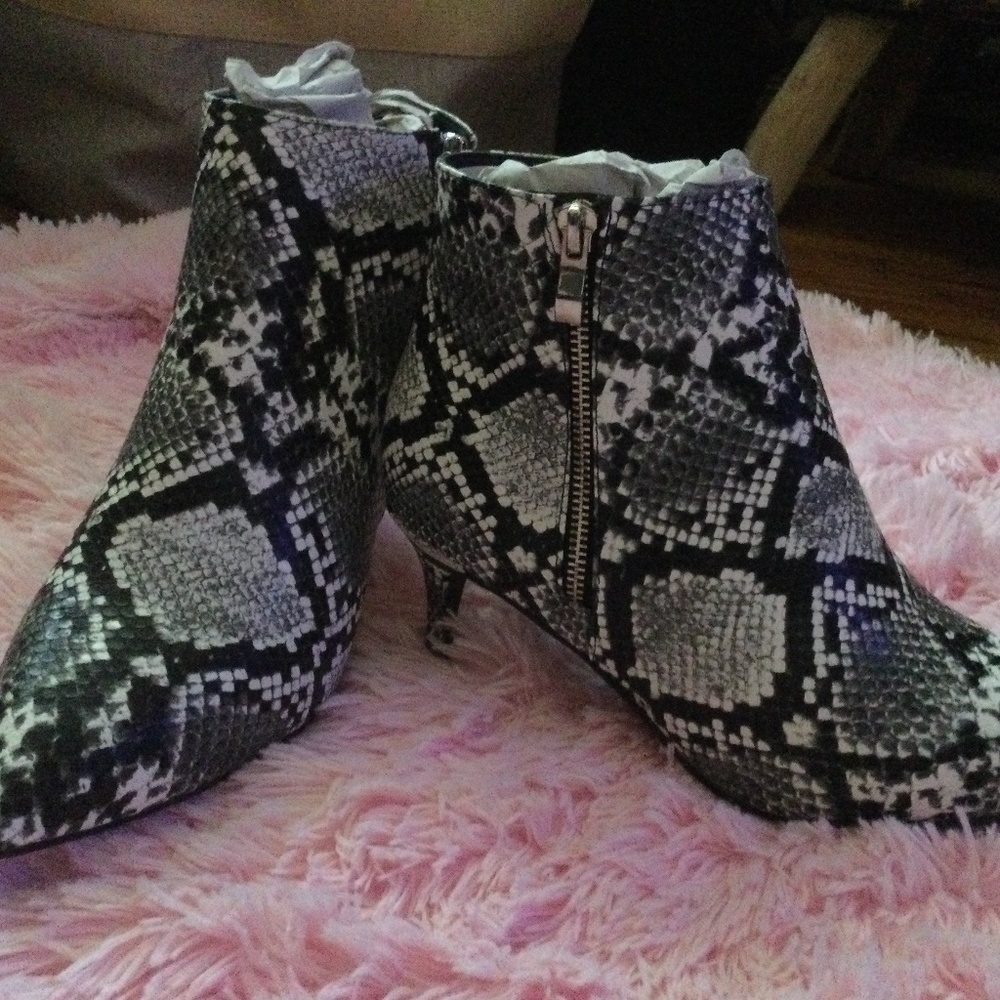 Brand new snake boots